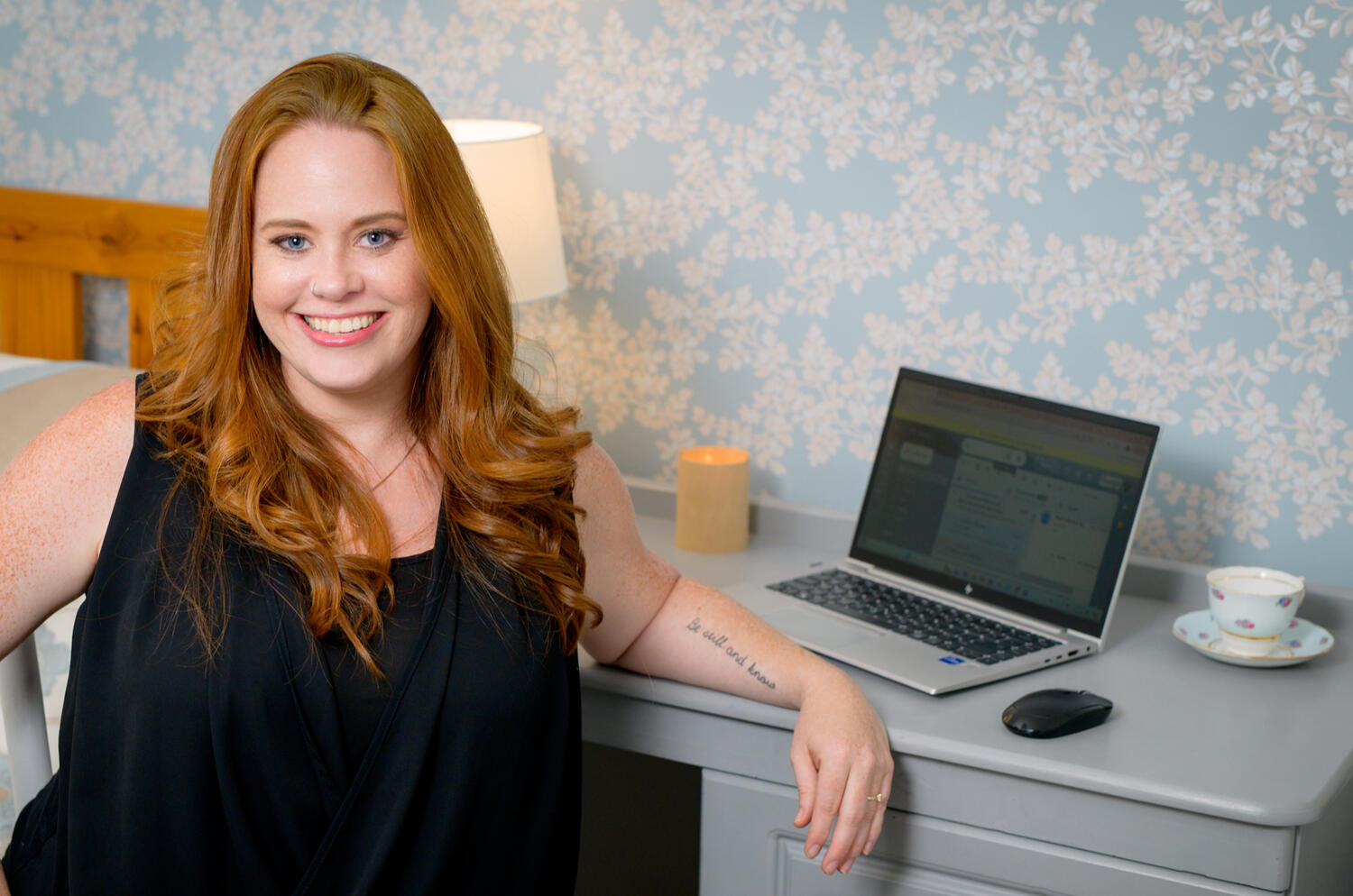 Colleen sitting at computer